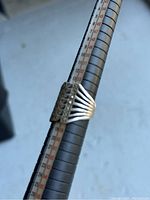 Vintage woman’s silver ring on ring sizer showing size 7.5 confirmation.