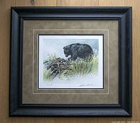 Front view of framed print against wall