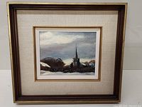 Framed oil painting showing full artwork with signature and frame details.