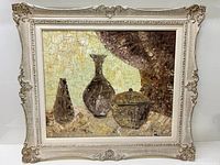 Full view of the framed impasto oil painting depicting vessels including two vases and a lidded container.