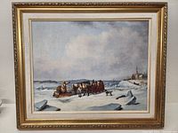 Full view of the framed artwork showing a winter scene with horse-drawn sleigh on ice and a building with steeple in background.
