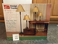 Box front showing the 4-piece lamp set including 2 table lamps, 1 floor lamp, and 1 accent lamp with their heights and overall look