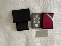 Image showing the original black box containing the uncirculated 1992 Canadian coin collection, including certificate and maroon folder