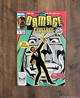 Front cover photo of Damage Control #2 comic book with Marvel and Spider-Man logos, showing excellent shape and vibrant colors.