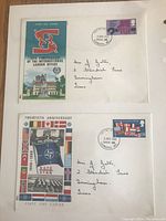 Two first day covers showcasing 75th Anniversary of the International Labour Office and 20th Anniversary NATO with detailed colorful graphics and postmarks dated April 2, 1969.