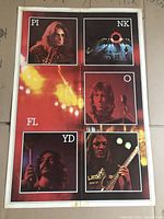 Full view of the Pink Floyd poster showing all images and text as well as wear marks such as tape and pin holes.