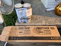 Box of Duotack 365 adhesive with product codes and quantities visible