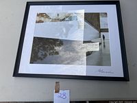 Full view of the framed photographic print by Eric Bornstein. Shows multiple geometric patterns and shadows with a signature in the bottom right.