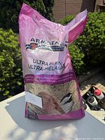Front view of large pink and purple bag of Armstrong Ultra Blend bird seed showing brand and blend name