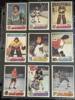 Front side showing nine 1977-78 O-Pee-Chee hockey cards featuring NHL players from different teams.