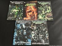 Front covers of five Blackest Night and Green Lantern DC Comics softcover books displayed in two rows on a black background.