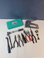 Entire lot of assorted hand tools and a precision tool kit in a green case