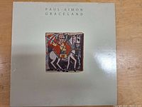 Front cover of Paul Simon Graceland album showing the artwork and title