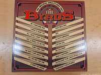 Front cover of The Byrds LP The Original Singles 1965-1967 Volume 1 with track listing for Side 1 and Side 2.