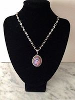 Sterling silver chain necklace displayed on bust with Mexican opal glass pendant attached, showing overall length and design.
