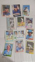 Image showing assortment of vintage baseball cards laid out, with visible players from Astros, Mariners, White Sox, and others.