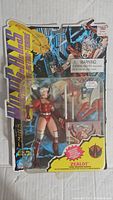Front view of Wild C.A.T.S Zealot action figure in original sealed package, showing figure and accessories.
