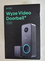 Front of the box showing Wyze Video Doorbell V2 unit and small chime accessory illustration.