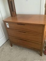 Front view of dresser showing overall appearance and drawer configuration