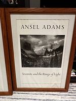 Framed print showing Ansel Adams name, title, and part of the mount with oak frame.