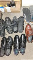 Men's shoes and shoe care items including dress shoes, tennis shoes, polish, and shoe horns in first photo.
