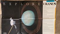 Folded poster with large image of Uranus with rings and a spacecraft, includes informational text about Uranus.