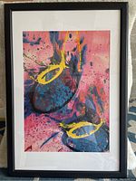 Full frontal view of the framed print showing the entire colorful composition and frame.