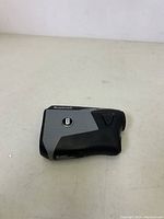 Top angle view of Bushnell BITE Tour V5 showing overall shape and button placement