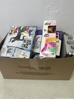 Full view of the miscellaneous box showing various packed items, including the 2nd Skin costume and Sip N Pop box.