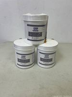 Four Jaysuing Invisible Waterproof Agent containers stacked and shrink-wrapped; front label visible showing brand and product name.