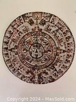 Front view showing the detailed Mayan Aztec calendar design in red and brown staining.