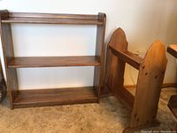 Front and side view of the larger wooden shelf and smaller book display shelf showing wood grain and finish