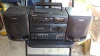 Front view of Sony Mega Bass radio cassette player with two detachable speakers on the sides.