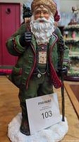 Front view of Pipka Tyrolean Santa figurine showing full body and painted details including hat, jacket, and accessories.