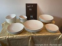 Overview of all dishes showing stacks of plates and bowls