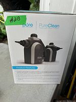 Front and side views of the Pure Enrichment PureClean Pressurized Steam Cleaner box showing the product and branding details.