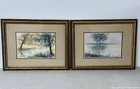 Two framed watercolor paintings side by side, showing overall condition and framing