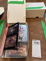 Open box labeled as Penny Hardaway Assortment with visible card stack inside.