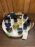 Tray of assorted men’s fragrances from above