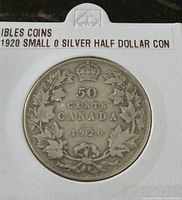 Reverse side showing the denomination '50 CENTS CANADA 1920' with a wreath and crown design.