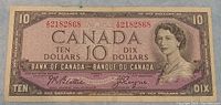 Front side of the 1954 Canadian ten dollar bank note showing Queen Elizabeth II portrait and serial number A2182868.