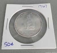 Reverse side showing howling wolf, denomination and date