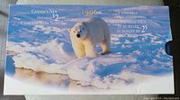 Original package showing the 1996 Canada's New Uncirculated $2 Coin and Bank Note Set with an image of a polar bear on ice.