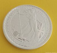 Obverse side of the silver round showing Britannia holding a trident and shield. The coin is dated 2023 with .999 fine silver and 1 oz weight markings.