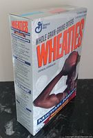 Side view showing Wheaties and Michael Jordan portrait on unopened box.