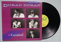 Front cover of Duran Duran Carnival Mini-LP showing the purple sleeve with band member photos and text