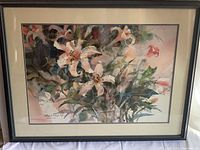 Full view of framed watercolor painting with cream and blue mat, black wooden frame.