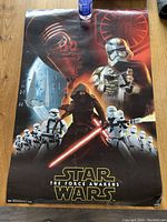 Full view of the Star Wars The Force Awakens 24x36 inch poster showing main characters Kylo Ren, Stormtroopers, First Order Snowtrooper, and Star Wars logo.