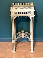 Full front view of the table against blue wall