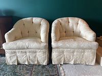 Front view of both chairs side by side showing overall design and matching upholstery